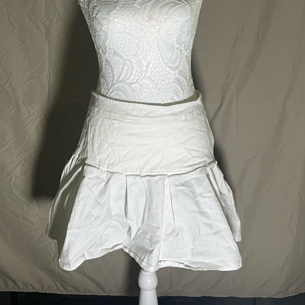 White pleated size small skirt